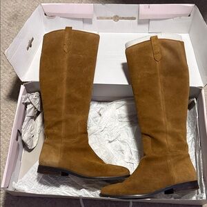 Women’s IvankaTrump boots size 9.5